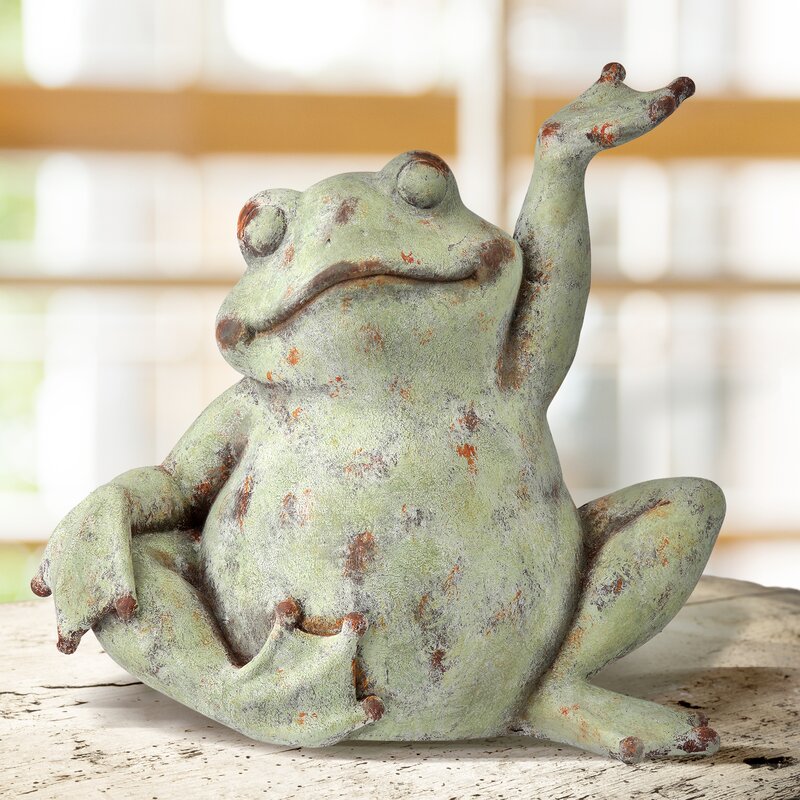 reclining frog statue